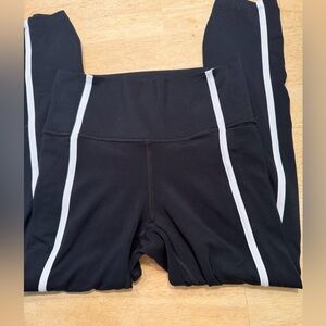 A lot of 5 under Armour leggings